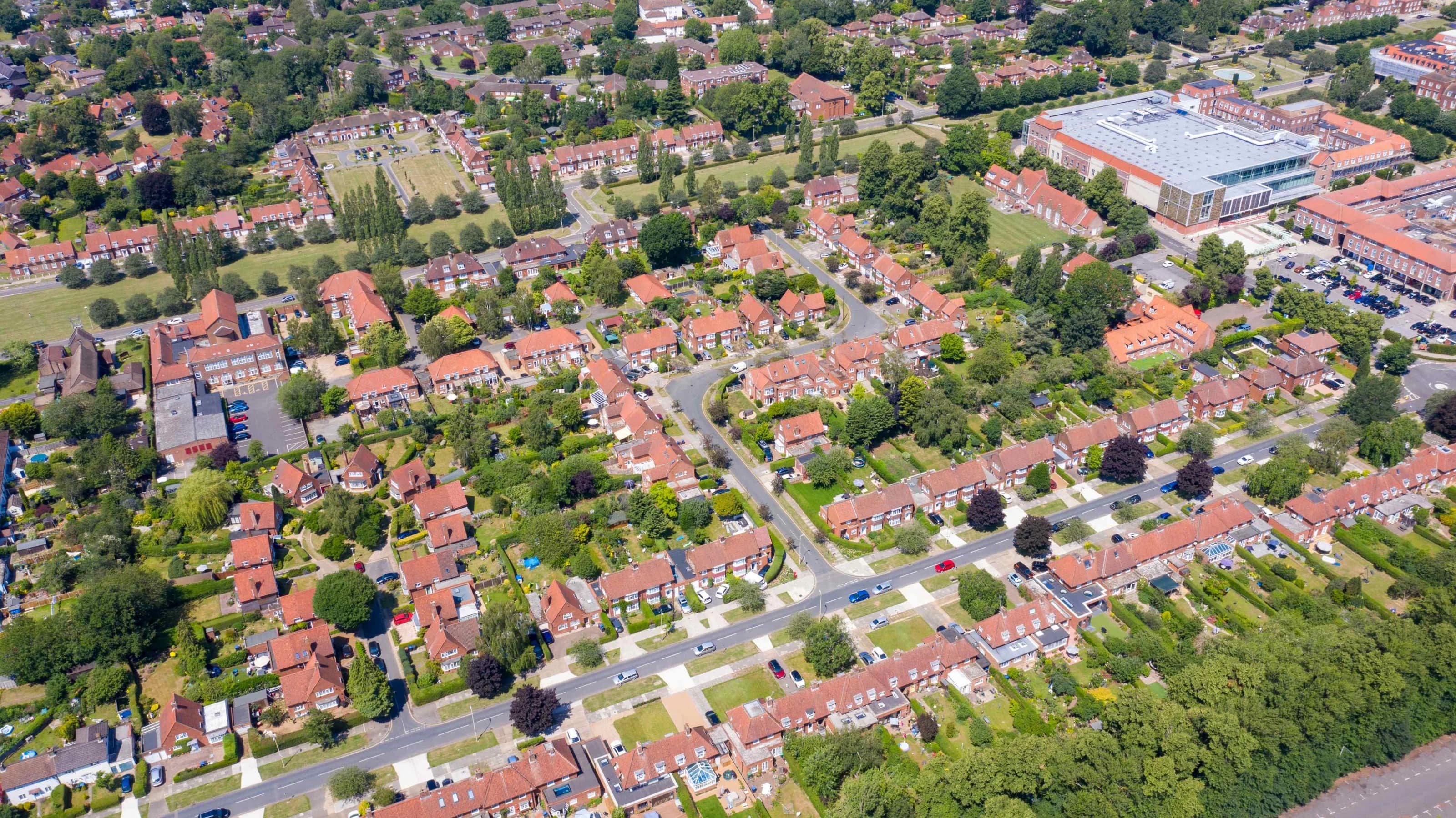 Aerial photo of the British town of Stevenage in Hertfordshire UK showing a typical British housing estate with rows of houses in the village