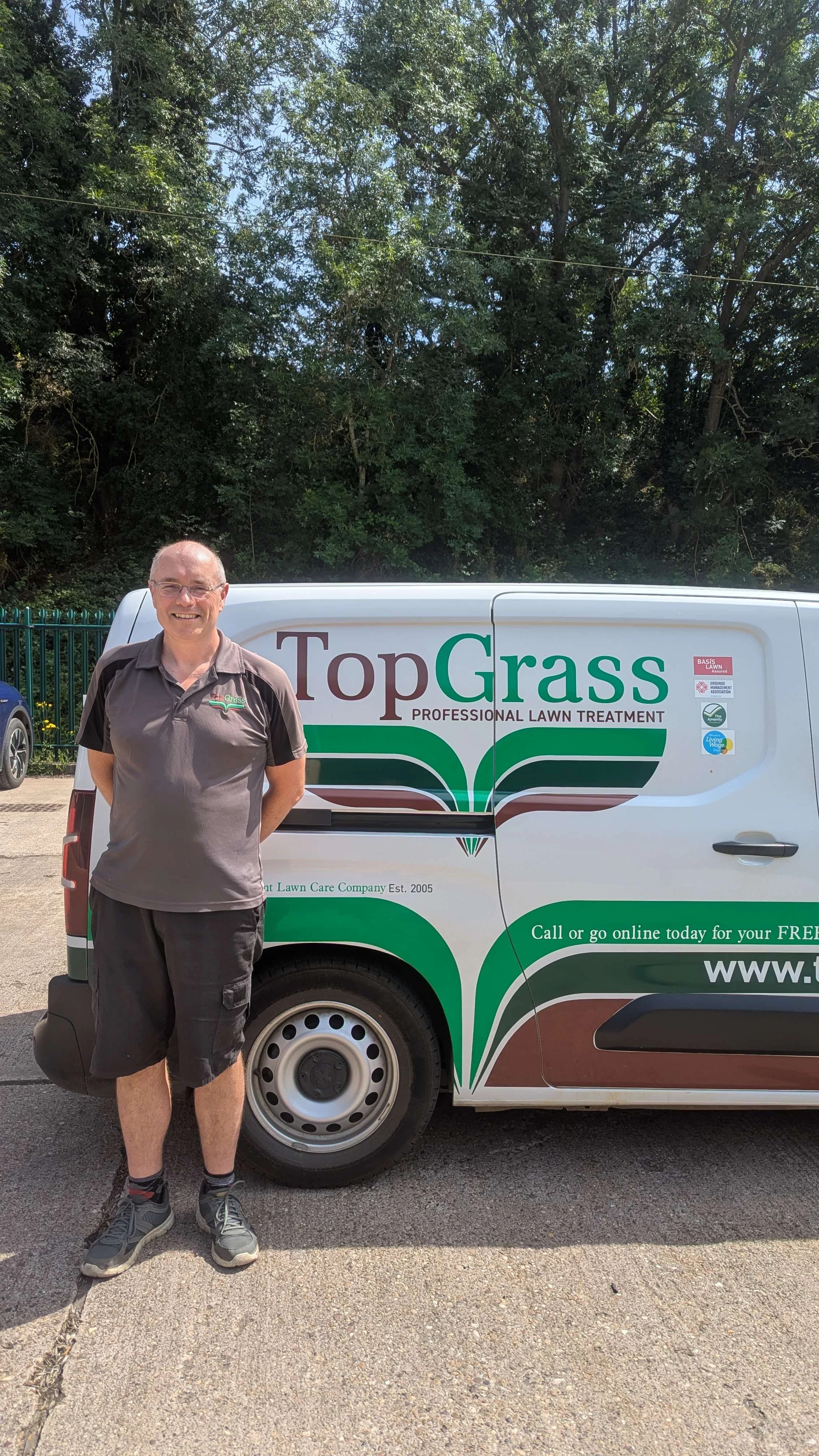 Picture of Craig Mitchell in front of TopGrass van